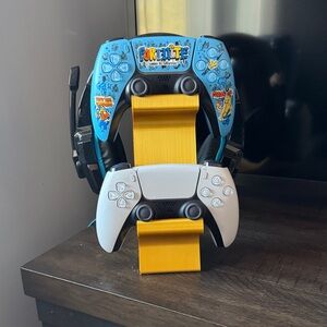 3D printer  PS5 Controller Stand. Holds two controllers plus headset.